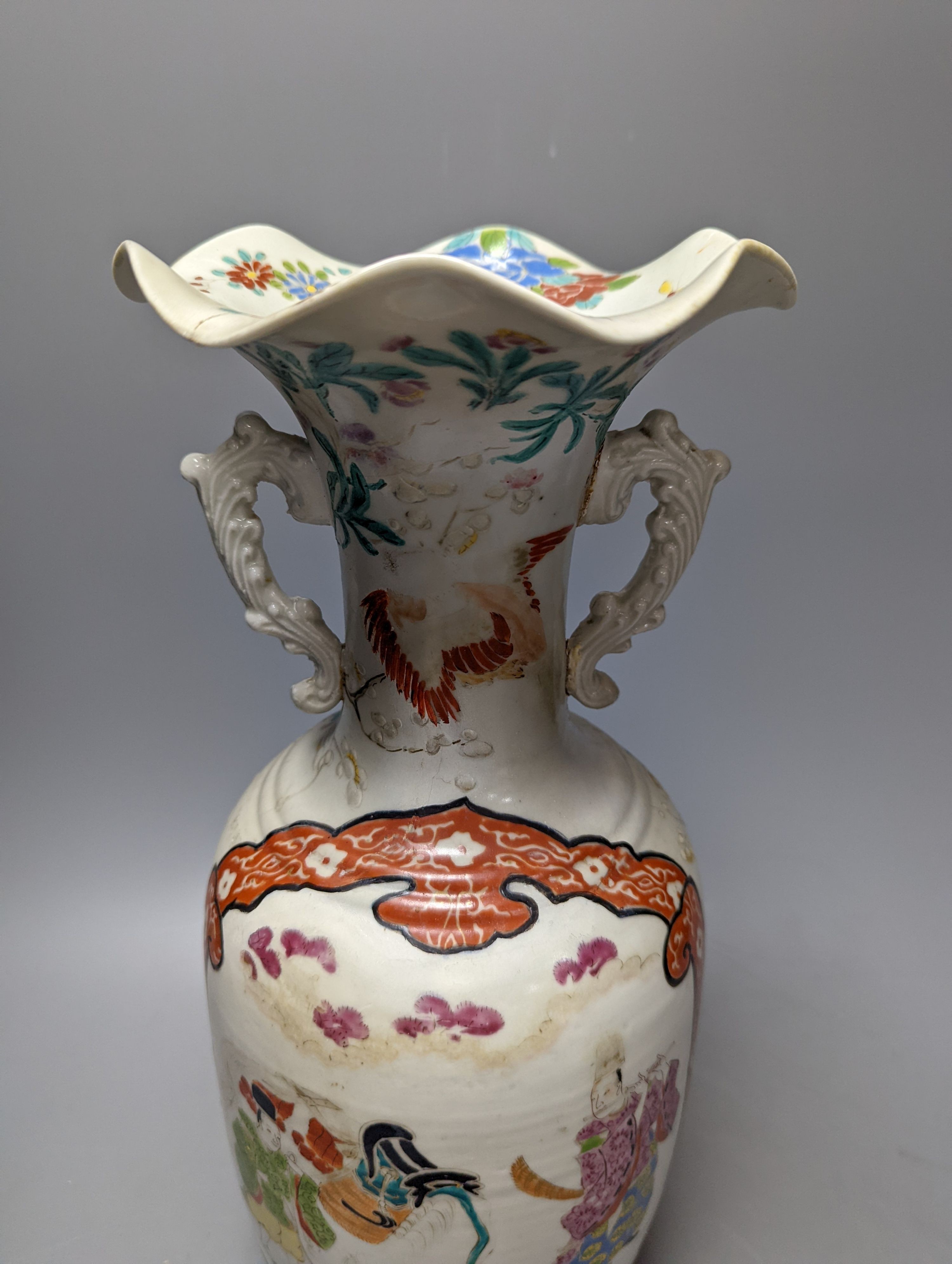 A Chinese famille rose vase and two ginger jars, together with a Japanese vase, 38cm